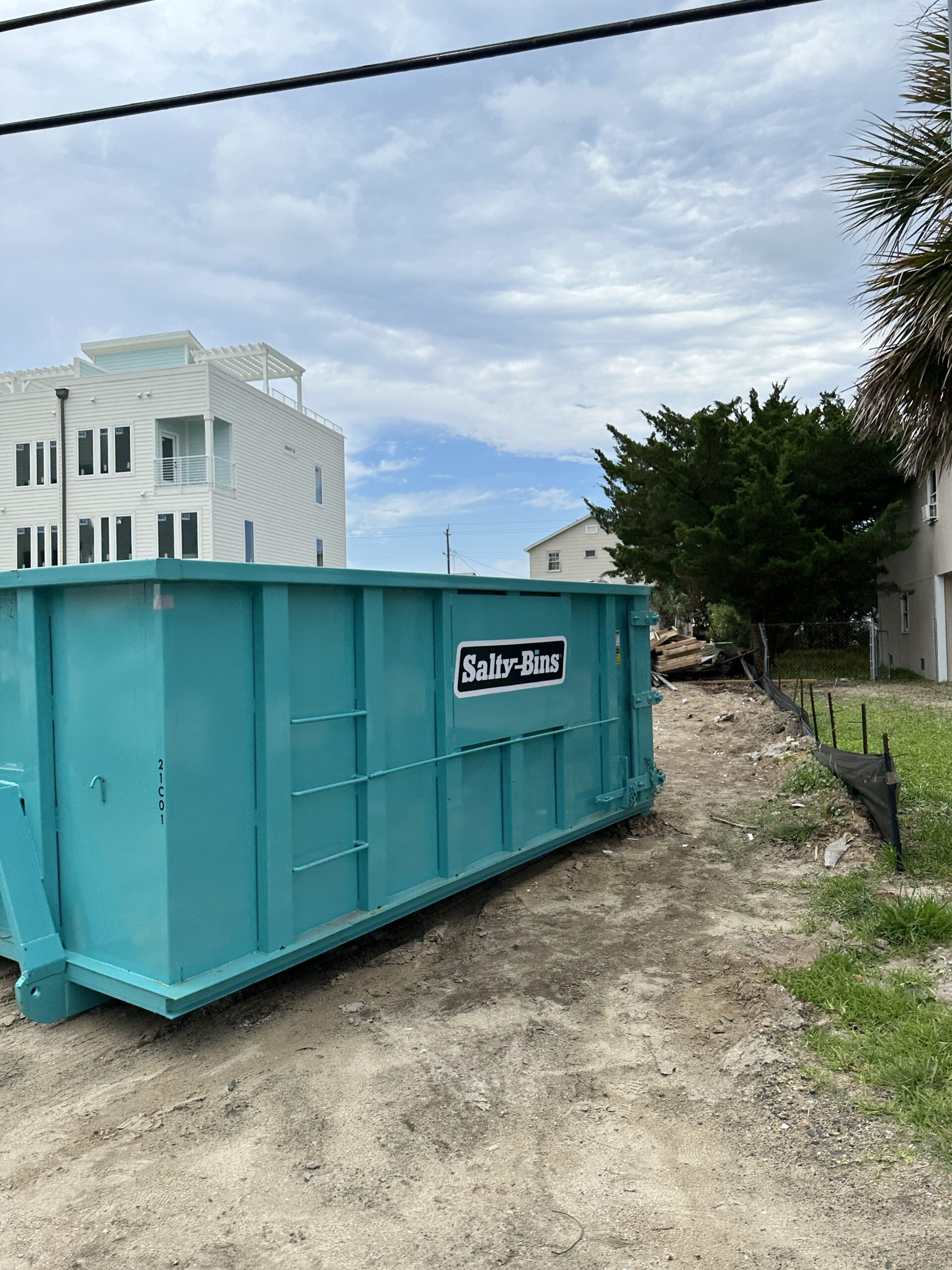 Salty Bins 20YD Standard Roll Off on a construction lot in Wrightsville Beach, NC.